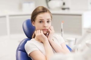 terrified patient at dental clinic